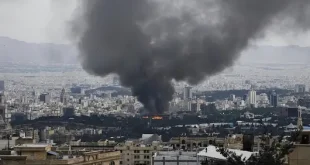 Smoke rises over Tehran skyline after US and Israeli joint military strikes on Iran on February 28, 2026