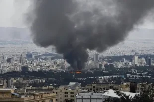 Smoke rises over Tehran skyline after US and Israeli joint military strikes on Iran on February 28, 2026