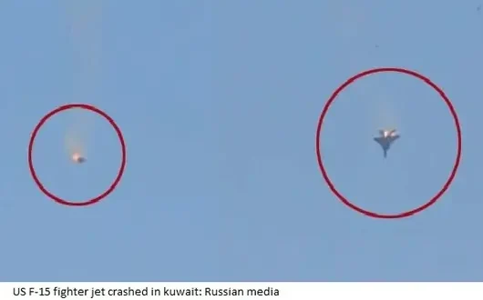 US F-15 fighter jet engulfed in flames as it crashes in Kuwait, pilot ejects with parachute visible